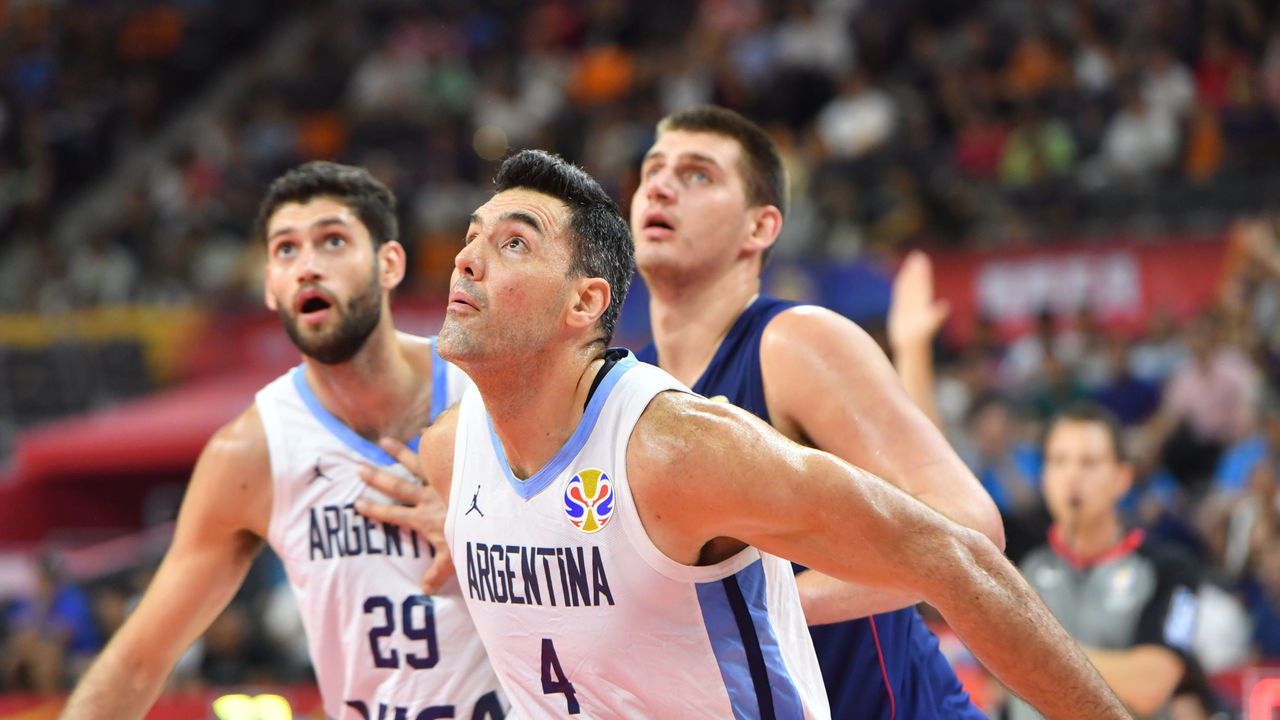 DONGGUAN, CHINA - SEPTEMBER 10: Luis Scola #4 of Team Argentina boxes out against Nikola Jokic #15 of Team Serbia during the 2019 FIBA World Cup Quarter-Finals at the Dongguan Basketball Center on September 10, 2019 in Dongguan, China. NOTE TO USER: User expressly acknowledges and agrees that, by downloading and/or using this Photograph, user is consenting to the terms and conditions of the Getty Images License Agreement. Mandatory Copyright Notice: Copyright 2019 NBAE