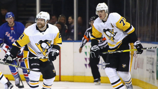 NEW YORK, NY - OCTOBER 17: Phil Kessel #81 and Evgeni Malkin #71 of the Pittsburgh Penguins skates against the New York Rangers at Madison Square Garden on October 17, 2017 in New York City. The Penguins defeated the Rangers 5-4 in overtime.