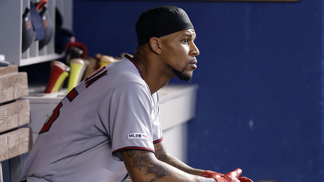 MIAMI, FLORIDA - AUGUST 01: Byron Buxton #25 of the Minnesota Twins looks on from the dugout against the Miami Marlins at Marlins Park on August 01, 2019 in Miami, Florida.
