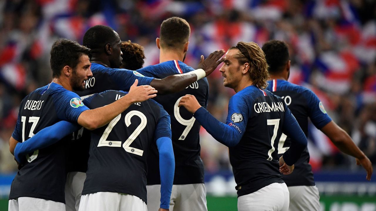 France's forward Kingsley Coman is congratulated by team mates after he scored a goal during the UEFA Euro 2020 qualifying Group H football match between France and Andorra on September 10, 2019 at the Stade de France in Saint-Denis, near Paris.