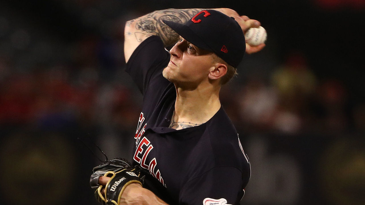 ANAHEIM, CALIFORNIA - SEPTEMBER 10: Pitcher Zach Plesac #65 of the Cleveland Indians pitches in the second inning during an MLB game against the Los Angeles Angels at Angel Stadium of Anaheim on September 10, 2019 in Anaheim, California.