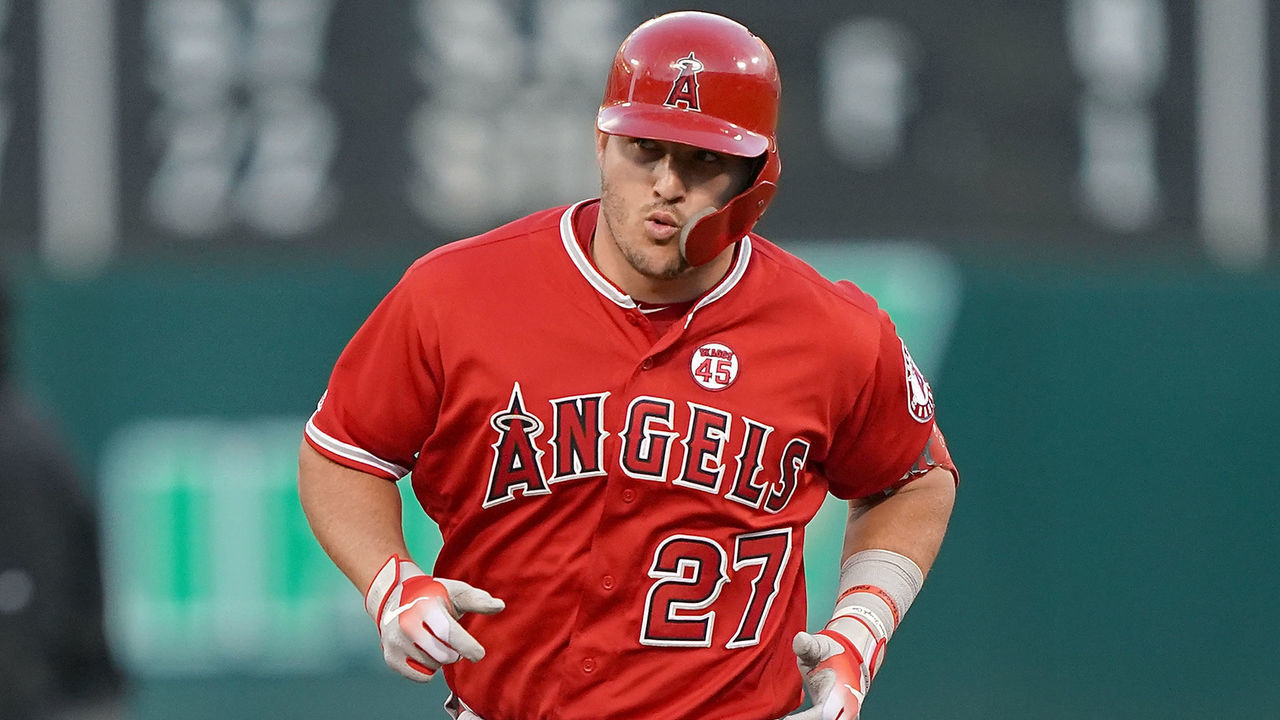 OAKLAND, CA - SEPTEMBER 03: Mike Trout #27 of the Los Angeles Angels of Anaheim trots around the bases after hitting a solo home run against the Oakland Athletics in the top of the first inning at Ring Central Coliseum on September 3, 2019 in Oakland, California.
