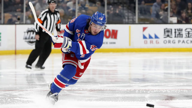BOSTON, MA - MARCH 27: New York Rangers left wing Brendan Lemieux (48) hammers the puck into the zone during a game between the Boston Bruins and the New York Rangers on March 27, 2019, at TD Garden in Boston, Massachusetts.