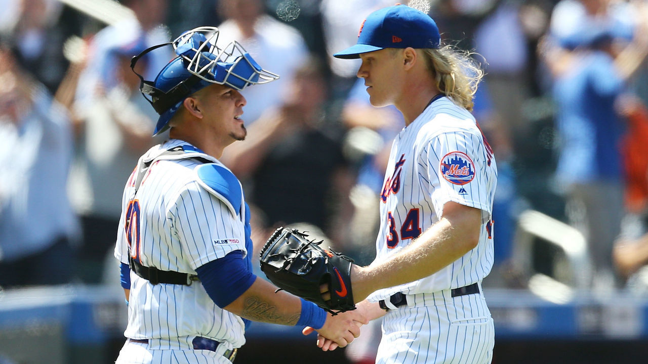 NEW YORK, NEW YORK - MAY 02: Noah Syndergaard #34 of the New York Mets celebrates with Wilson Ramos #40 after pitching a complete game shutout against the Cincinnati Reds at Citi Field on May 02, 2019 in the Queens borough of New York City. New York Mets defeated the Cincinnati Reds 1-0.