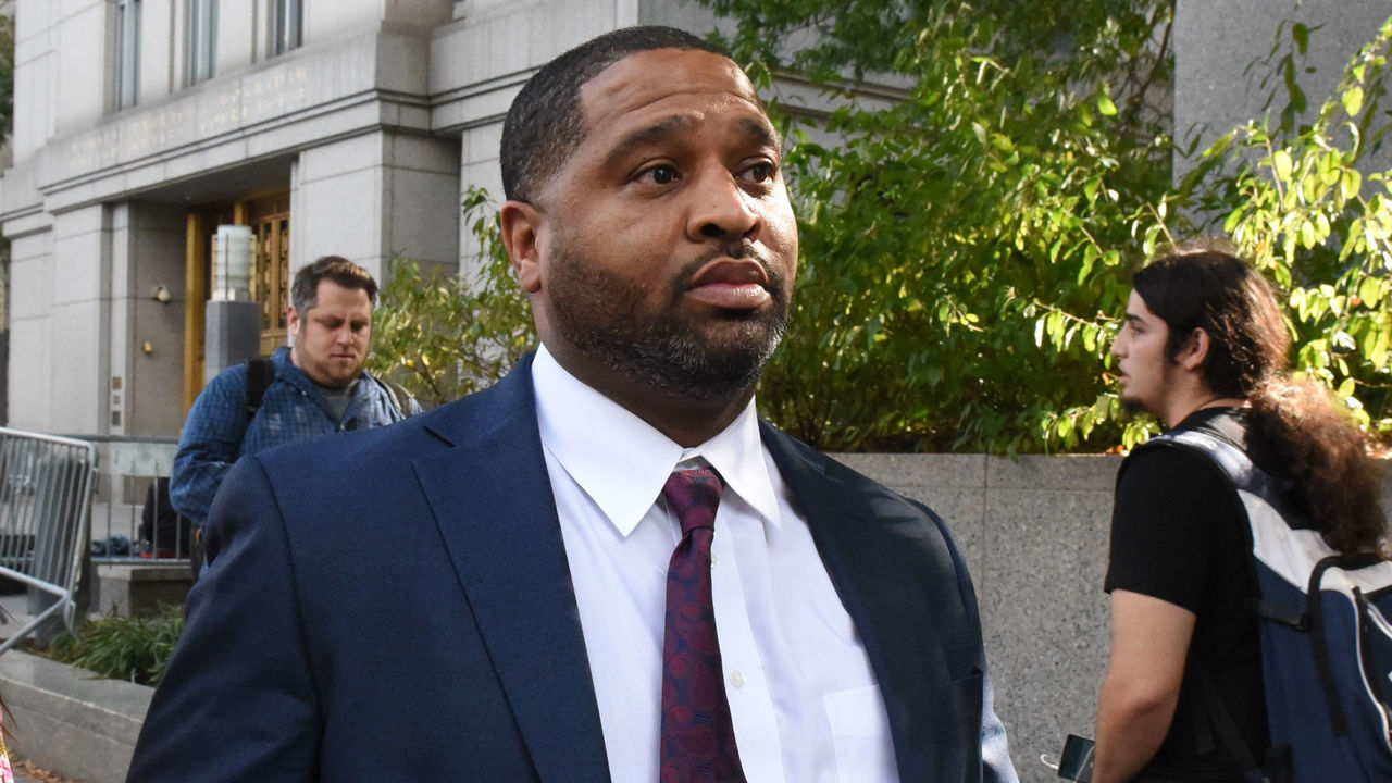 NEW YORK, NY - OCTOBER 10: Emanuel Richardson exits the Federal Courthouse in Manhattan on October 10, 2017 in New York City. Several people associated with NCAA Basketball have been charged as part of a corruption ring.