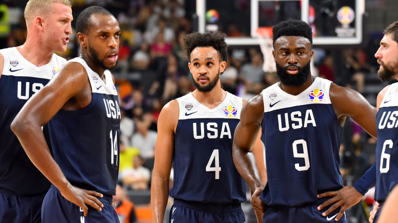 DONGGUAN, CHINA - SEPTEMBER 12: Khris Middleton #14, Derrick White #4, and Jaylen Brown #9 of USA look on during the game against Serbia during the 2019 FIBA World Cup on September 12, 2019 at the Dongguan Basketball Center in Dongguan, China. NOTE TO USER: User expressly acknowledges and agrees that, by downloading and/or using this photograph, user is consenting to the terms and conditions of the Getty Images License Agreement. Mandatory Copyright Notice: Copyright 2019 NBAE