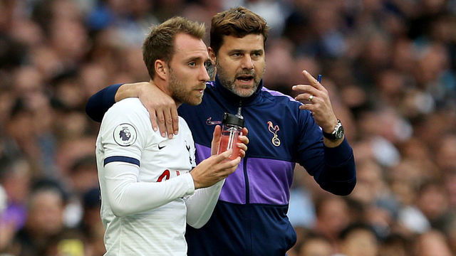 Tottenham Hotspur's Christian Eriksen (left) is brought on as a substitute by manager Mauricio Pochettino (right) Tottenham Hotspur v Aston Villa - Premier League - Tottenham Hotspur Stadium 10-08-2019 .