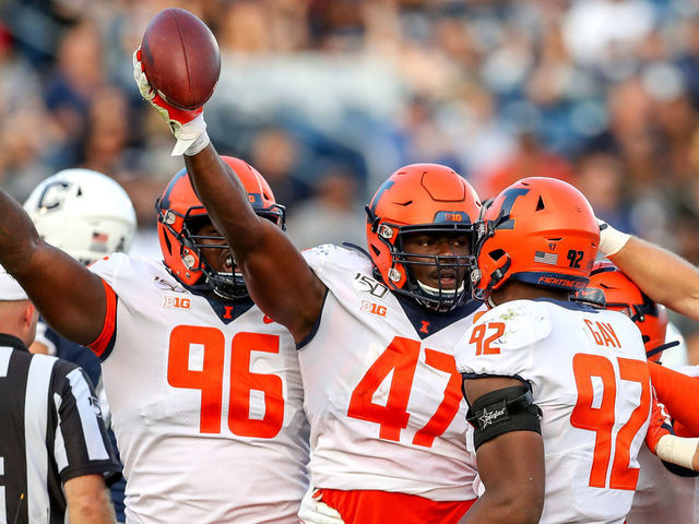 EAST HARTFORD, CT - SEPTEMBER 07: Illinois Fighting Illini Oluwole Betiku Jr. (47) comes up with a fumble recovery during the game between the Illinois Fighting Illini and the UConn Huskies played on September 07, 2019 at Pratt & Whitney Stadium in East Hartford, CT.