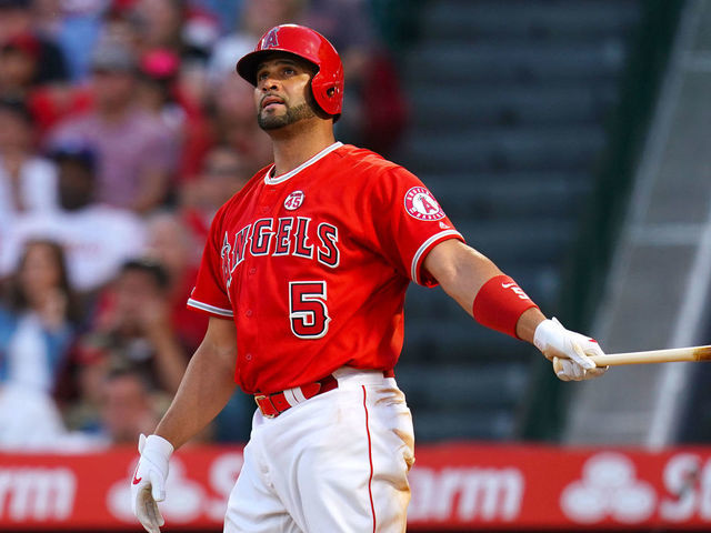 ANAHEIM, CA - JULY 13: Albert Pujols #5 of the Los Angeles Angels of Anaheim looks on during the MLB game between Los Angeles Angels and Seattle Mariners at Angel Stadium of Anaheim on July 13, 2019 in Anaheim, California.
