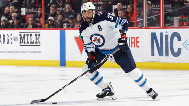 OTTAWA, ON - FEBRUARY 9: Dustin Byfuglien #33 of the Winnipeg Jets skates with the puck against the Ottawa Senators at Canadian Tire Centre on February 9, 2019 in Ottawa, Ontario, Canada.