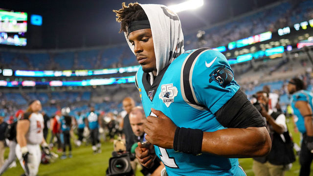 CHARLOTTE, NORTH CAROLINA - SEPTEMBER 12: Cam Newton #1 of the Carolina Panthers runs off the field after their game against the Tampa Bay Buccaneers at Bank of America Stadium on September 12, 2019 in Charlotte, North Carolina.