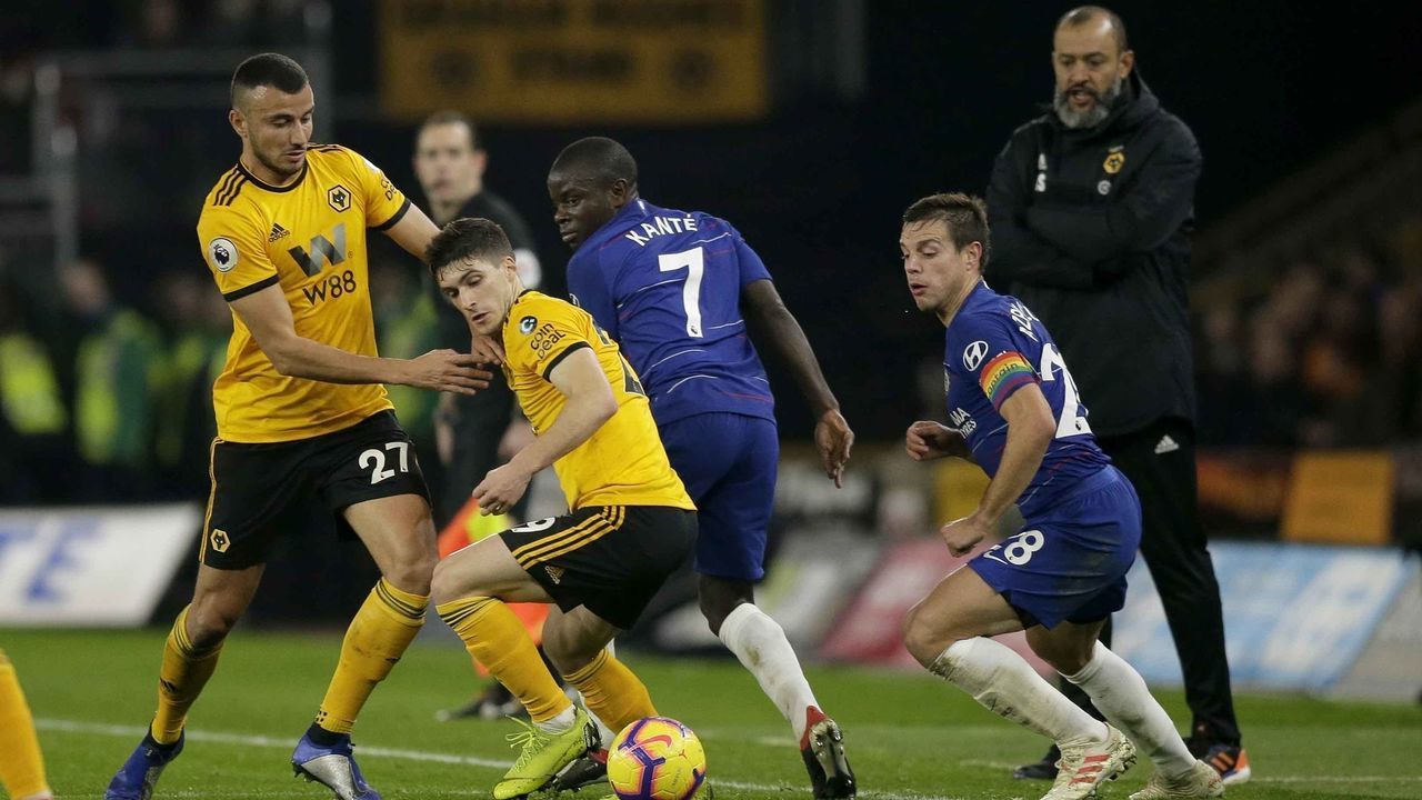 WOLVERHAMPTON, ENGLAND - DECEMBER 05: Wolverhampton Wanderers manager Nuno Espirito Santo looks on as players compete for the ball during the Premier League match between Wolverhampton Wanderers and Chelsea FC at Molineux on December 05, 2018 in Wolverhampton, United Kingdom.