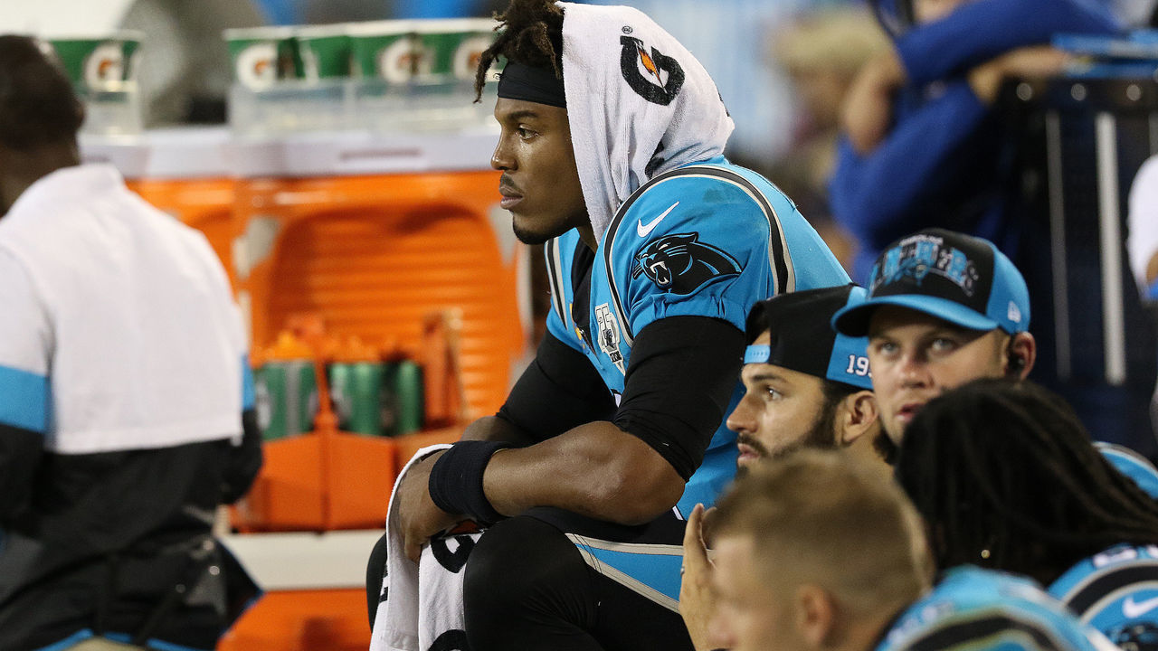 CHARLOTTE, NC - SEPTEMBER 12: Cam Newton (1) quarterback of Carolina sits on the sidelines in disbelief as the Panthers trail the Buccaneers late in the game during a NFL football game between the Tampa Bay Buccaneers and the Carolina Panthers on September 12, 2019, at Bank of America Stadium in Charlotte, N.C.