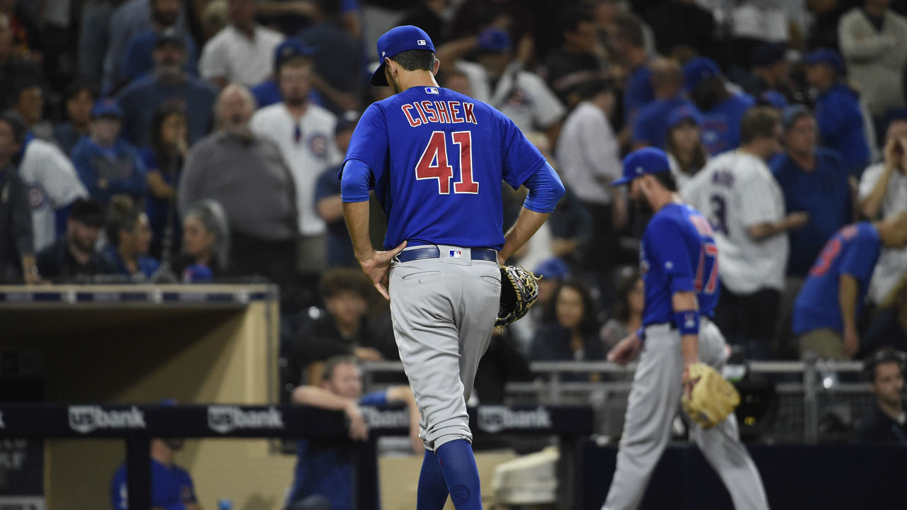 SAN DIEGO, CA - SEPTEMBER 10: Steve Cishek #41 of the Chicago Cubs walks back to the dugout after walking in a run during the tenth inning of a baseball game against the San Diego Padres at Petco Park September 10, 2019 in San Diego, California. The Padres won 9-8.