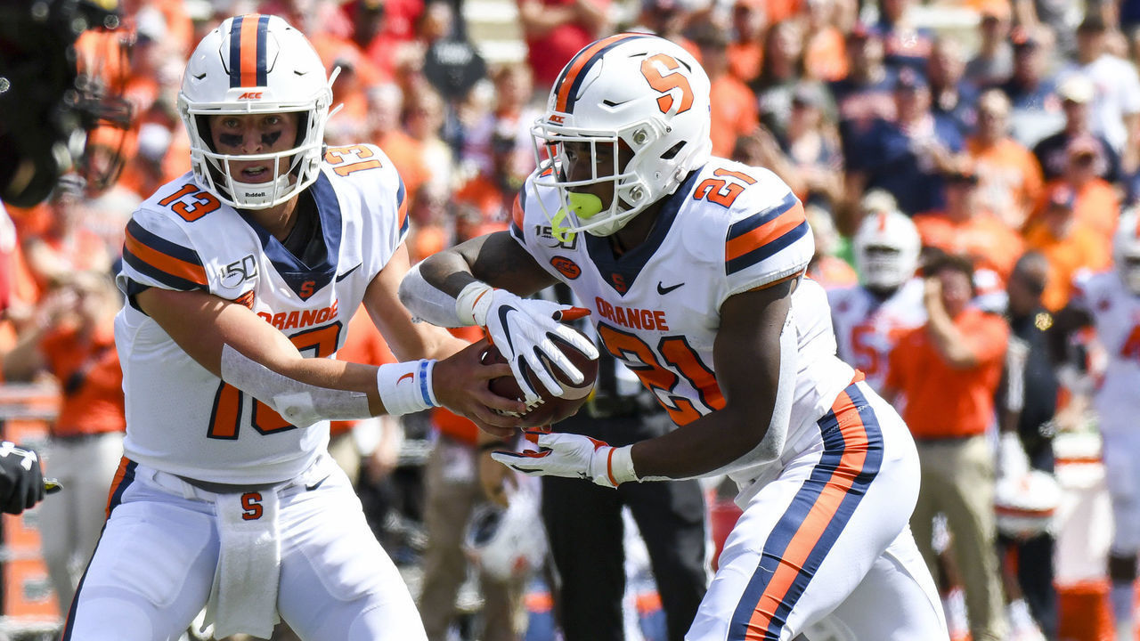 COLLEGE PARK, MD - SEPTEMBER 7: Syracuse Orange quarterback Tommy DeVito (13) hands the ball off to running back Moe Neal (21) against the Maryland Terrapins on September 7, 2019, at Capital One Field at Maryland Stadium in College Park, MD. Photo by Mark Goldman/Icon Sportswire via Getty Images)