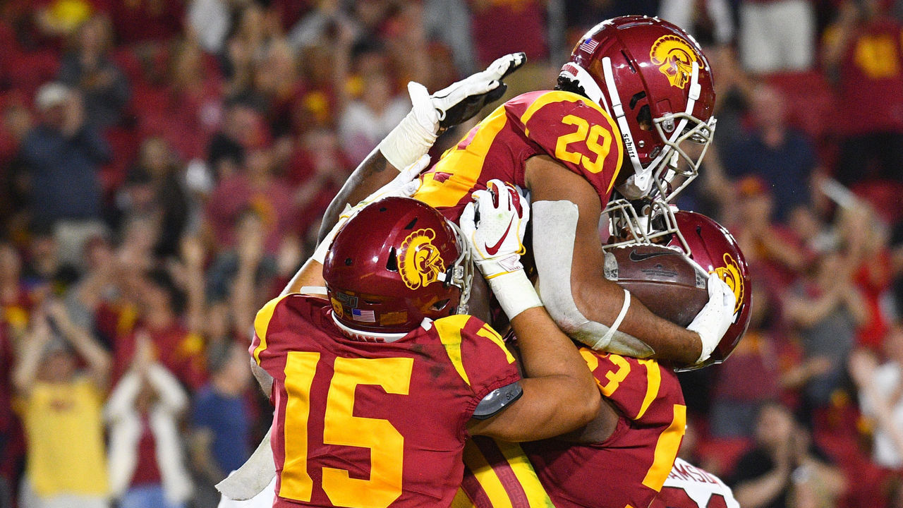 LOS ANGELES, CA - SEPTEMBER 07: USC (29) Vavae Malepeai (RB) celebrates a touchdown with USC (53) Drew Richmond (T) and USC (15) Drake London (WR) during a college football game between the Stanford Cardinal and the USC Trojans on September 7, 2019, at Los Angeles Memorial Coliseum in Los Angeles, CA.