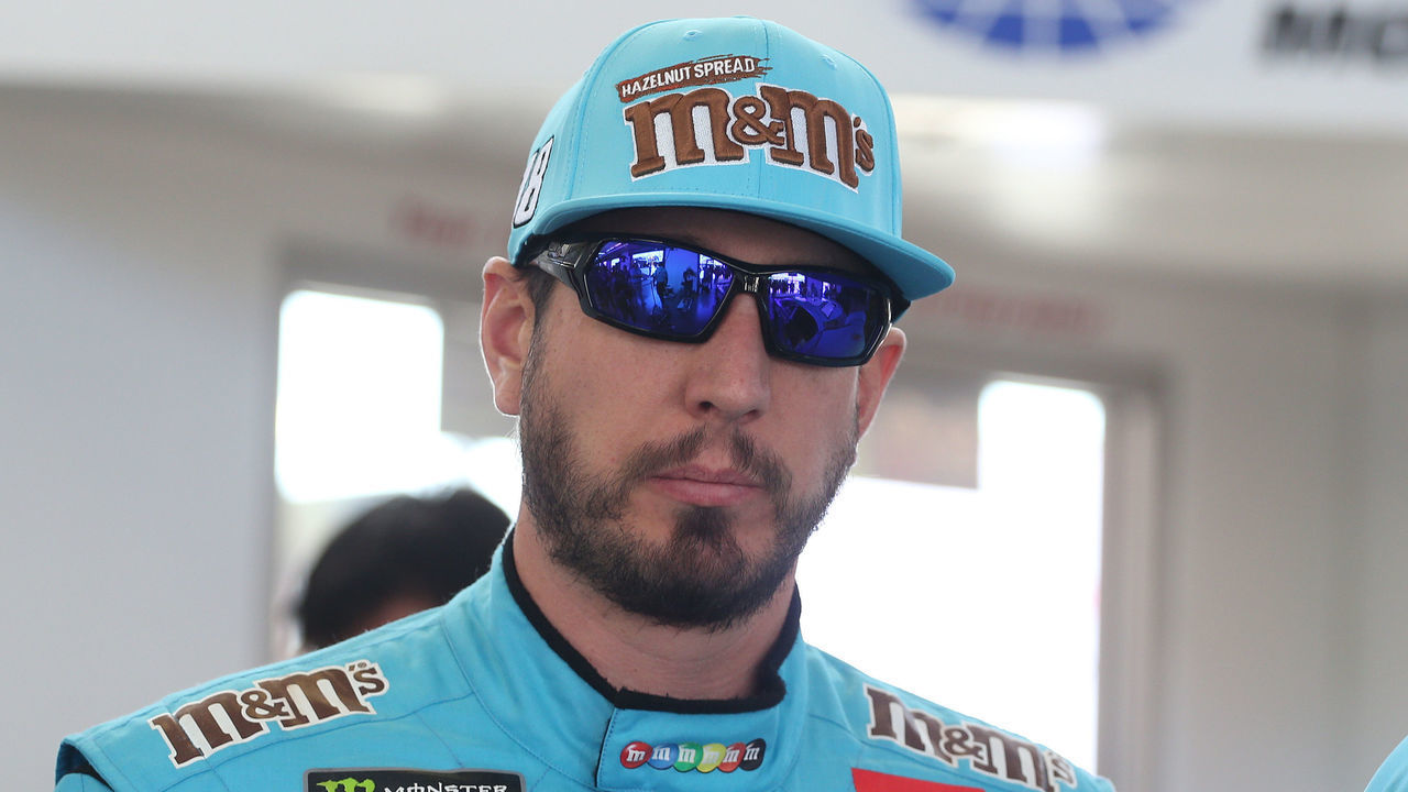 LAS VEGAS, NEVADA - SEPTEMBER 13: Kyle Busch, driver of the #18 M&M's Hazelnut Toyota, stands by his car during practice for the Monster Energy NASCAR Cup Series South Point 400 at Las Vegas Motor Speedway on September 13, 2019 in Las Vegas, Nevada.