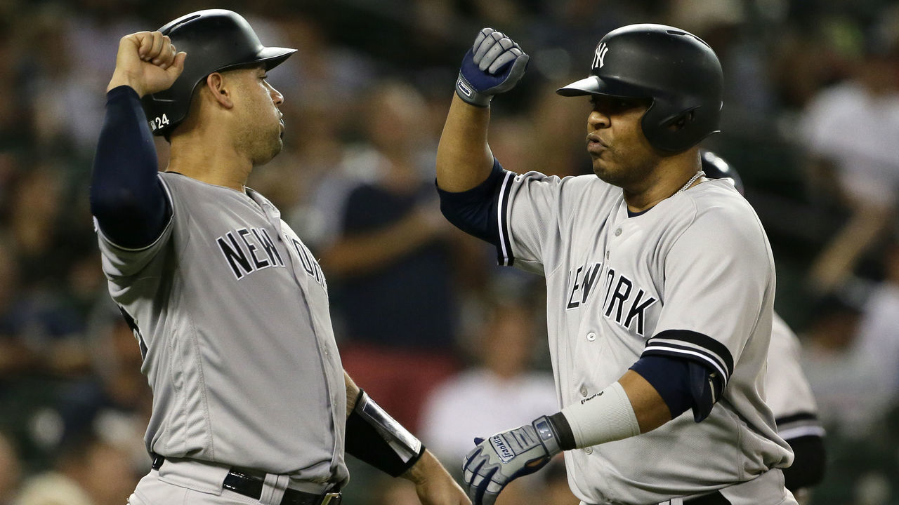 DETROIT, MI - SEPTEMBER 10: Edwin Encarnacion #30 of the New York Yankees (R) celebrates with Gary Sanchez #24 after hitting a two-run home run to tie the game against the Detroit Tigers at 10-10 during the seventh inning at Comerica Park on September 10, 2019 in Detroit, Michigan.