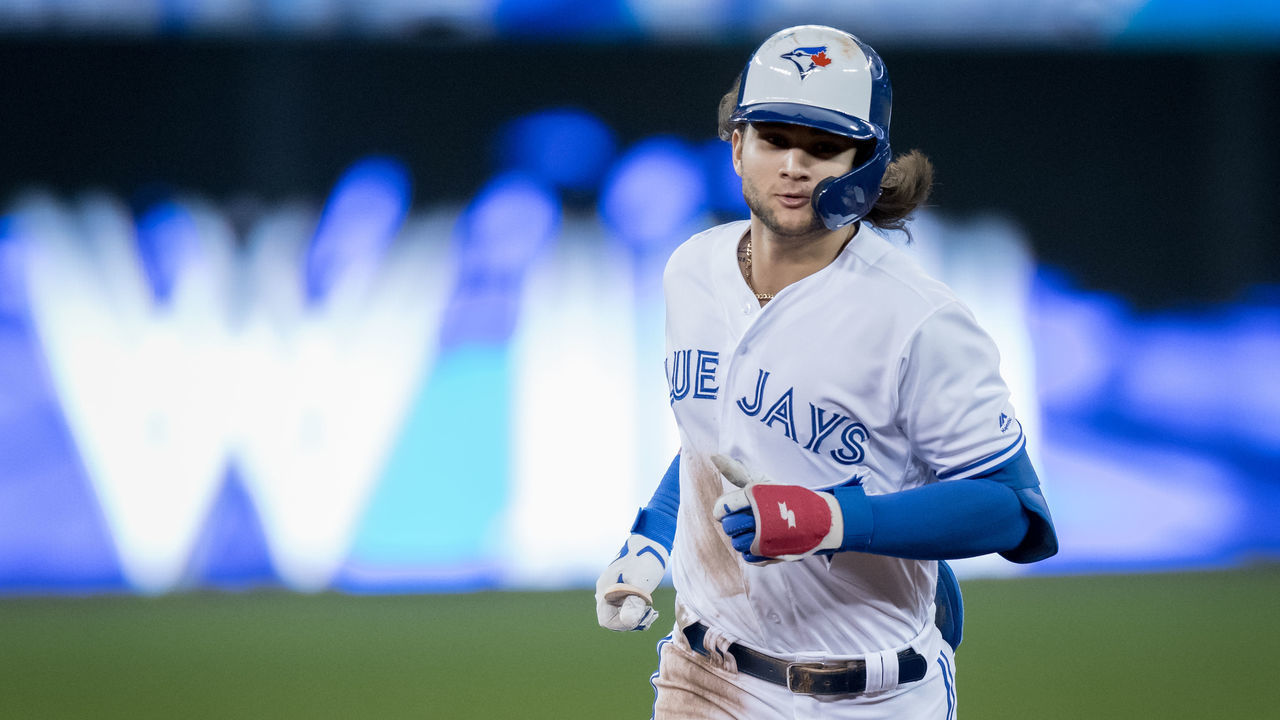 TORONTO, ON - SEPTEMBER 13: Toronto Blue Jays Infield Bo Bichette (11) runs the bases after hitting a game winning home run during the twelfth inning of the MLB regular season game between the Toronto Blue Jays and the New York Yankees on September 13, 2019, at Rogers Centre in Toronto, ON, Canada.