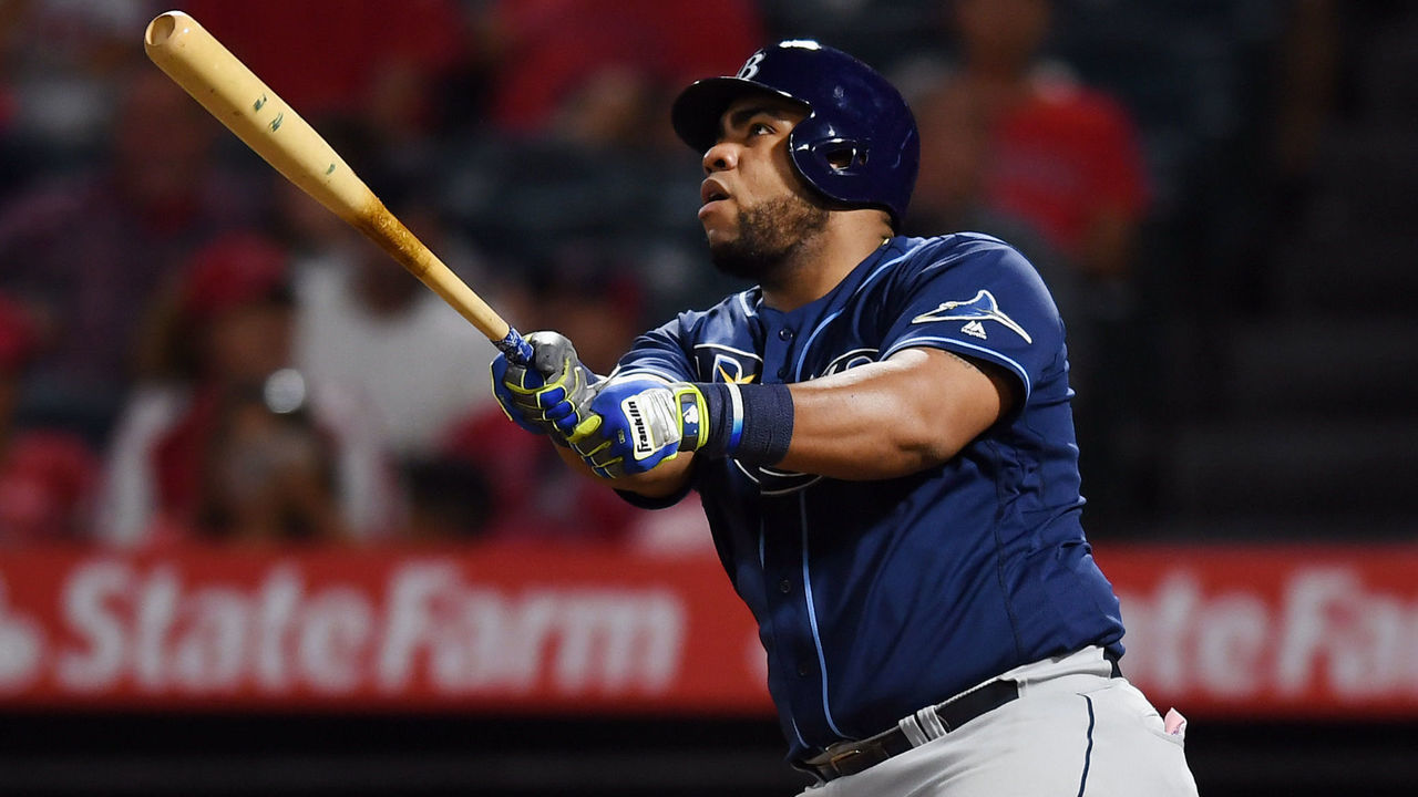ANAHEIM, CA - SEPTEMBER 13: Tampa Bay Rays first baseman Jesus Aguilar (21) drives in a run on a sacrifice fly in the ninth inning of a game against the Los Angeles Angels played on September 13, 2019 at Angel Stadium of Anaheim in Anaheim, CA.