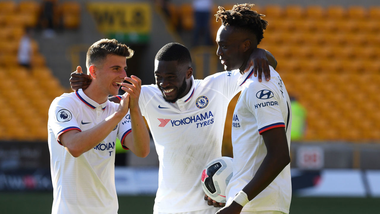 WOLVERHAMPTON, ENGLAND - SEPTEMBER 14: Mason Mount, Fikayo Tomori and Tammy Abraham of Chelsea celebrate following their sides victory in the Premier League match between Wolverhampton Wanderers and Chelsea FC at Molineux on September 14, 2019 in Wolverhampton, United Kingdom.