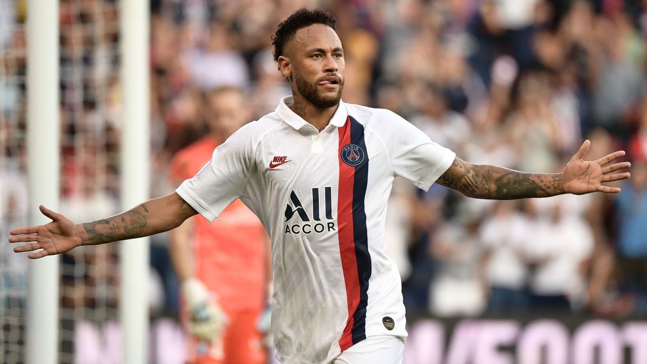 Paris Saint-Germain's Brazilian forward Neymar celebrates after scoring a goal during the French L1 football match between Paris Saint-Germain (PSG) and Racing Club de Strasbourg Alsace (RCS) on September 14, 2019 at the Parc des Princes stadium in Paris.