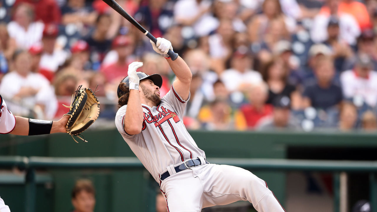 WASHINGTON, DC - SEPTEMBER 14: Charlie Culberson #8 of the Atlanta Braves reacts after getting hit by a ball in the seventh inning during a baseball game against the Washington Nationals at Nationals Park on September 14, 2019 in Washington, DC.