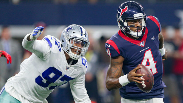 ARLINGTON, TX - AUGUST 24: Houston Texans quarterback Deshaun Watson (4) is chased Dallas Cowboys defensive end Taco Charlton (97) during the preseason game between the Houston Texans and Dallas Cowboys on August 24, 2019 at AT&T Stadium in Arlington, TX.