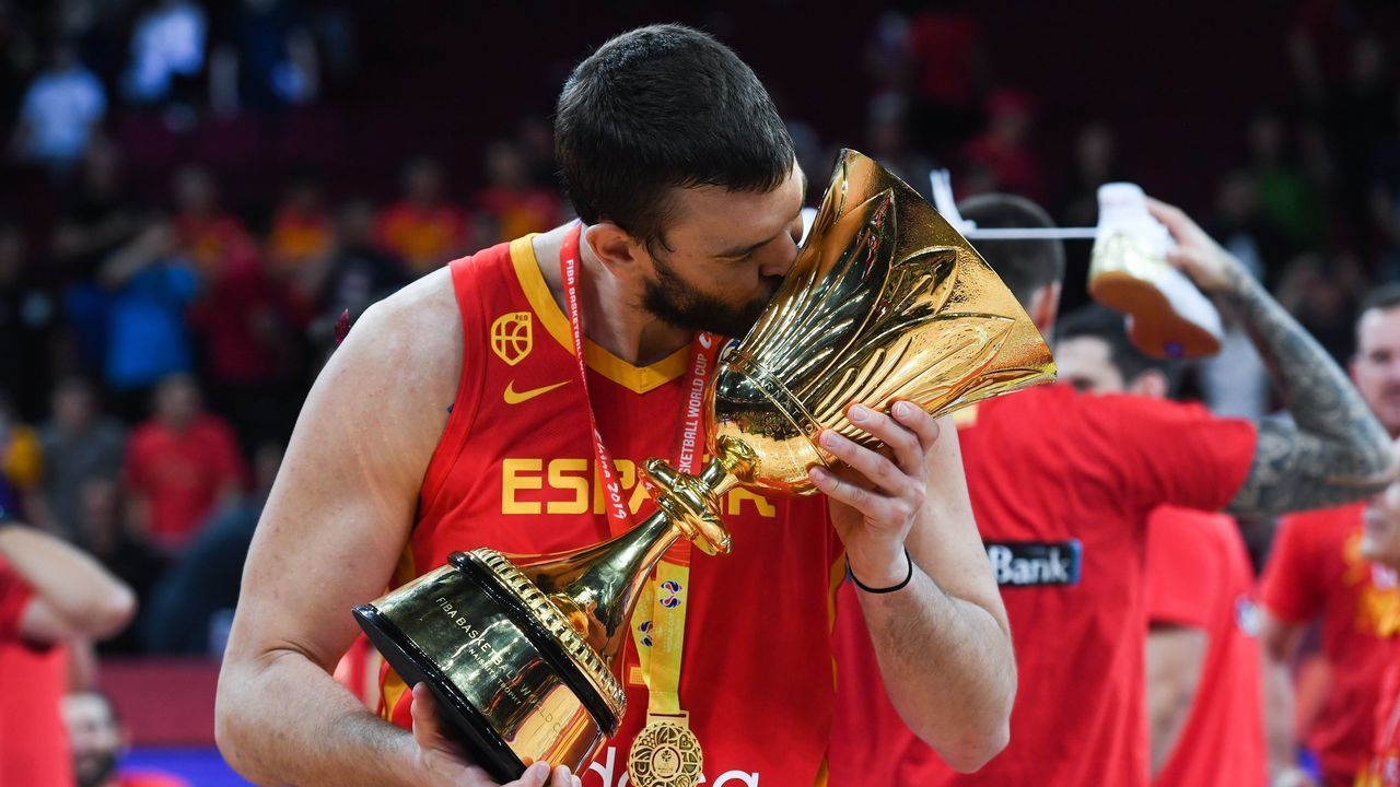 Spain's Marc Gasol celebrates with their winning trophy at the end of the Basketball World Cup final game between Argentina and Spain in Beijing on September 15, 2019.