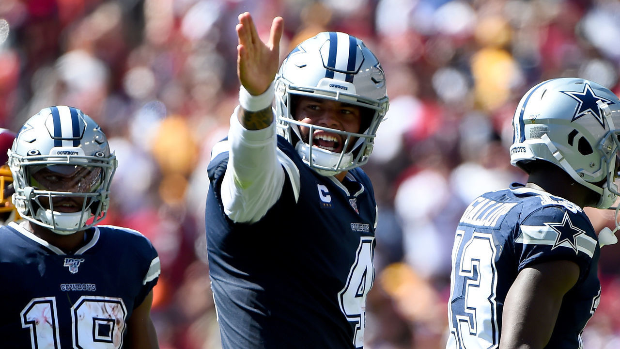 LANDOVER, MD - SEPTEMBER 15: Dak Prescott #4 of the Dallas Cowboys celebrates a first down against the Washington Redskins during the first half at FedExField on September 15, 2019 in Landover, Maryland.