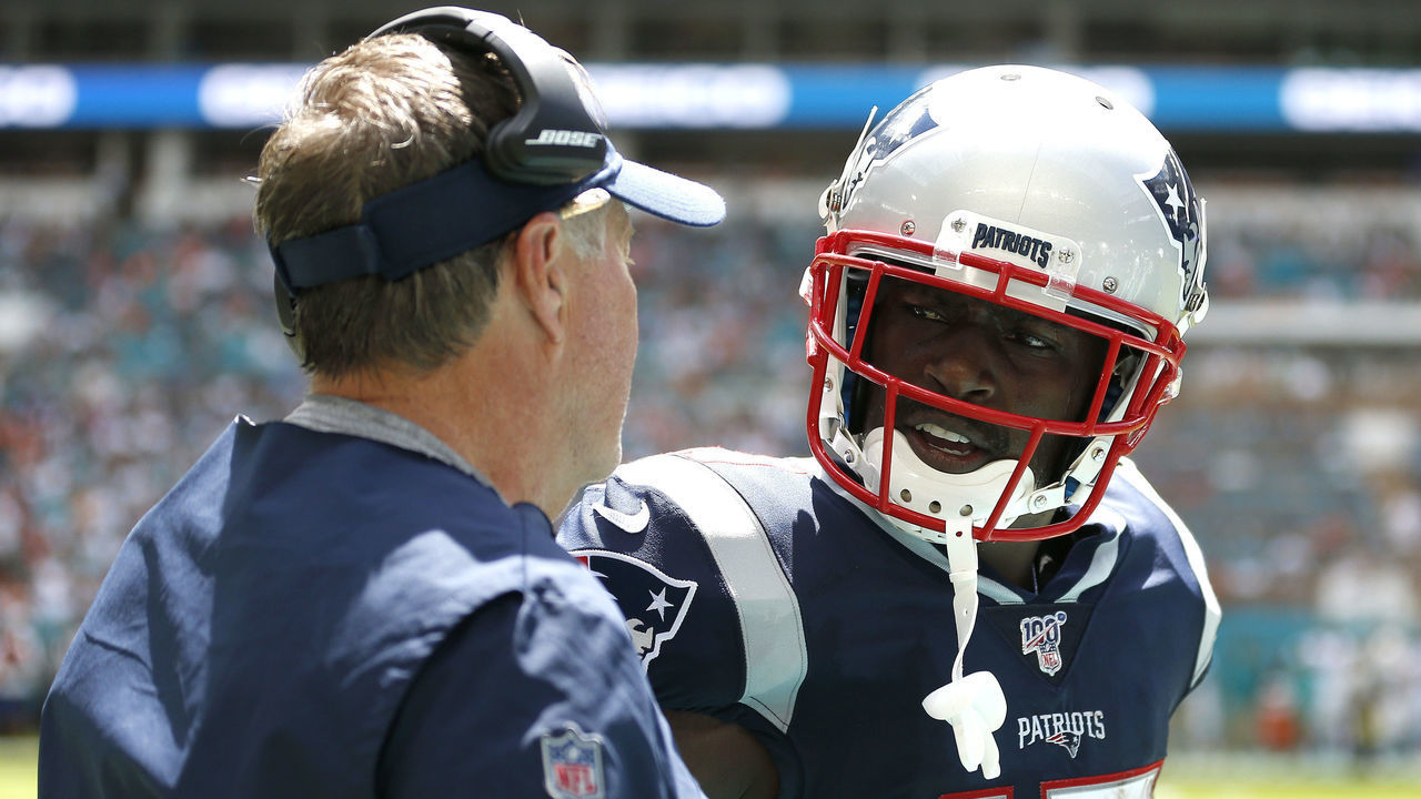 MIAMI, FLORIDA - SEPTEMBER 15: Antonio Brown #17 of the New England Patriots celebrates with head coach Bill Belichick after scoring a 20 yard touchdown thrown by Tom Brady #12 against the Miami Dolphins during the second quarter in the game at Hard Rock Stadium on September 15, 2019 in Miami, Florida.