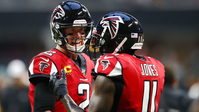 ATLANTA, GA - SEPTEMBER 15: Matt Ryan #2 of the Atlanta Falcons speaks with Julio Jones #11 prior to an NFL game against the Philadelphia Eagles at Mercedes-Benz Stadium on September 15, 2019 in Atlanta, Georgia.