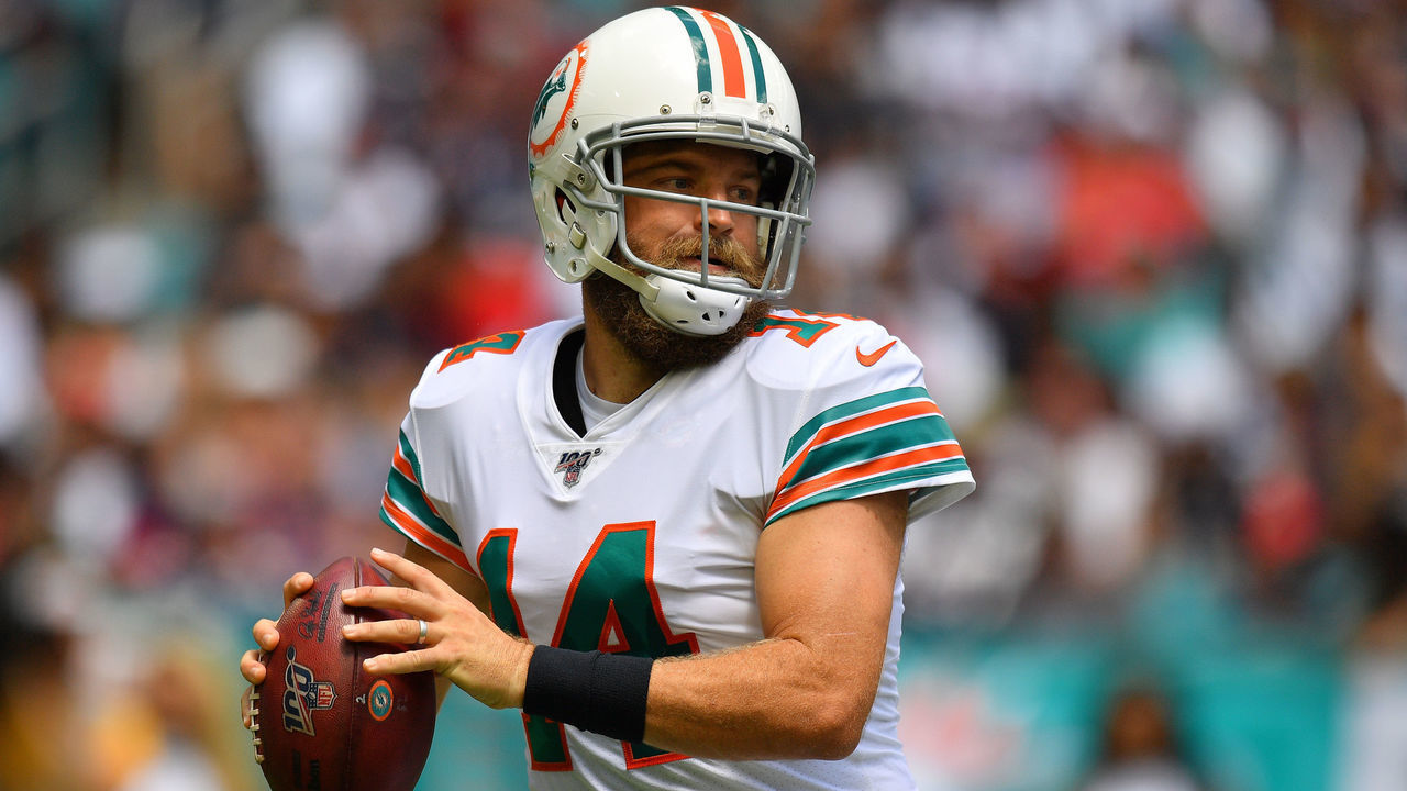 MIAMI, FLORIDA - SEPTEMBER 15: Ryan Fitzpatrick #14 of the Miami Dolphinslooks to pass in the first quarter against the New England Patriots at Hard Rock Stadium on September 15, 2019 in Miami, Florida.