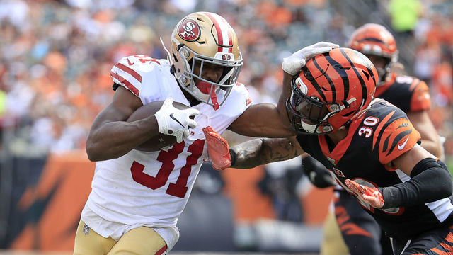 CINCINNATI, OHIO - SEPTEMBER 15: Raheem Mostert #31 of the San Francisco 49ers runs with the ball while defended by Jessie Bates III #30 the Cincinnati Bengals at Paul Brown Stadium on September 15, 2019 in Cincinnati, Ohio.