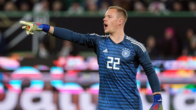 20 March 2019, Lower Saxony, Wolfsburg: Soccer: International match, Germany - Serbia in the Volkswagen Arena. Germany's goalkeeper Marc-Andre ter Stegen gives instructions. IMPORTANT NOTE: In accordance with the requirements of the DFL Deutsche Fußball Liga or the DFB Deutscher Fußball-Bund, it is prohibited to use or have used photographs taken in the stadium and/or the match in the form of sequence images and/or video-like photo sequences. Photo: Peter Steffen/dpa