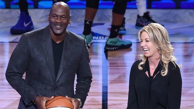 Former NBA star Michael Jordan and President of the Los Angeles Lakers Jeanie Buss attend the 2018 NBA All-Star Game, February 18, 2018 at Staples Center in Los Angeles, California. / AFP PHOTO / Robyn Beck