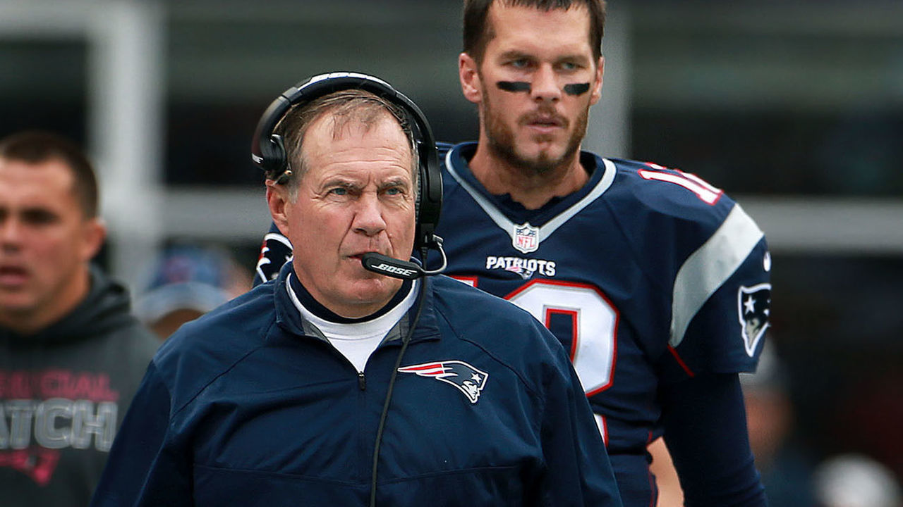 FOXBOROUGH, MA - OCTOBER 25: With only three days off between games, New England Patriots quarterback Tom Brady (rear) and head coach Bill Belichick (front) will have very little time to get ready for Thursday night's game against the Dolphins. Here they are pictured on the sidelines during Sunday's game against the New York Jets in a regular season NFL football game at Gillette Stadium.
