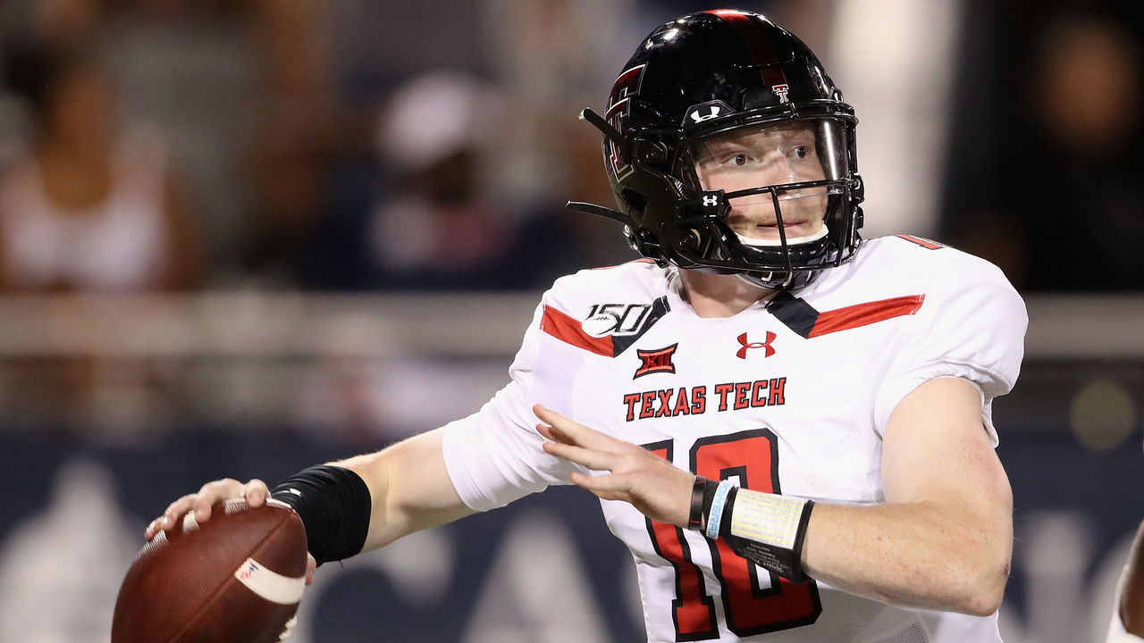 TUCSON, ARIZONA - SEPTEMBER 14: Quarterback Alan Bowman #10 of the Texas Tech Red Raiders looks t0 pass during the second half of the NCAAF game against the Arizona Wildcats at Arizona Stadium on September 14, 2019 in Tucson, Arizona.