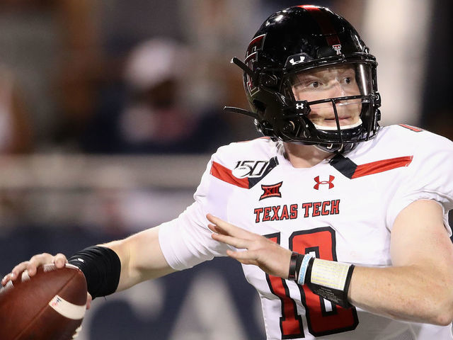 TUCSON, ARIZONA - SEPTEMBER 14: Quarterback Alan Bowman #10 of the Texas Tech Red Raiders looks t0 pass during the second half of the NCAAF game against the Arizona Wildcats at Arizona Stadium on September 14, 2019 in Tucson, Arizona.
