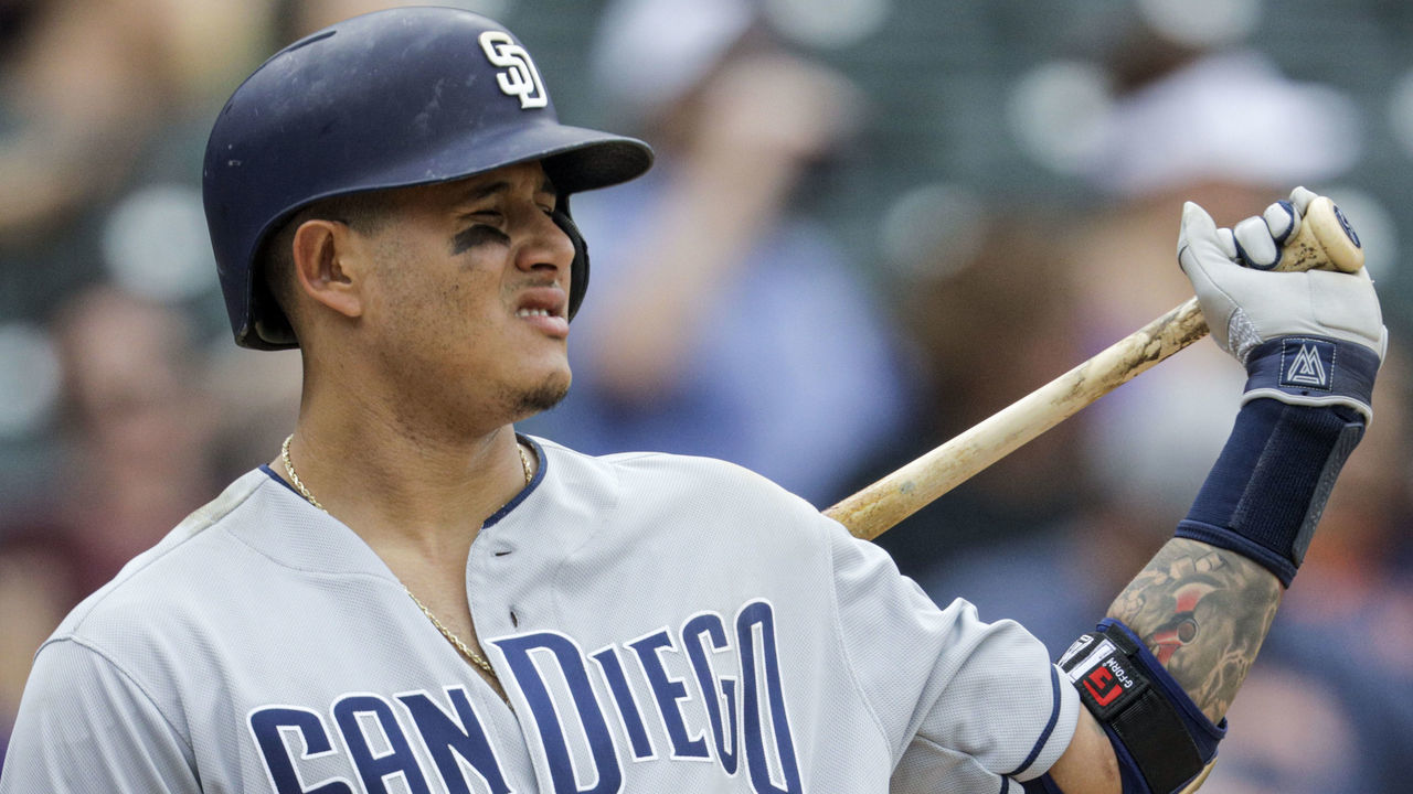 DENVER, CO - SEPTEMBER 15: Manny Machado #13 of the San Diego Padres waits for a pitch in the ninth inning against the Colorado Rockies at Coors Field on September 15, 2019 in Denver, Colorado. Colorado won 10-5. Machado went 0-4 with one walk.