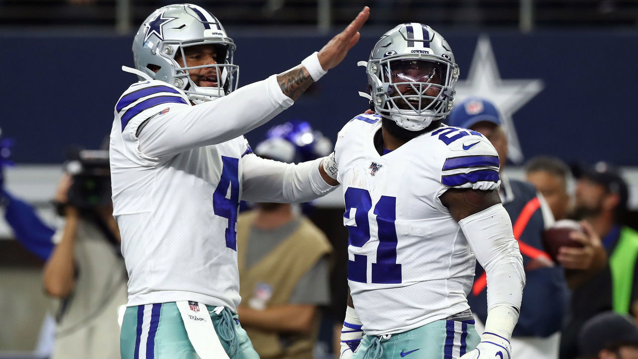 ARLINGTON, TEXAS - SEPTEMBER 08: (L-R) Dak Prescott #4 and Ezekiel Elliott #21 of the Dallas Cowboys celebrate a touchdown in the third quarter against the New York Giants at AT&T Stadium on September 08, 2019 in Arlington, Texas.