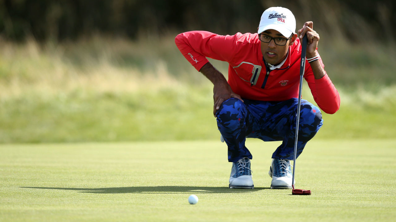 HOYLAKE, ENGLAND - SEPTEMBER 08: Akshay Bhatia of the United States lines up a putt on the second green in the singles matches during Day 2 of the Walker Cup at Royal Liverpool Golf Club on September 08, 2019 in Hoylake, England.