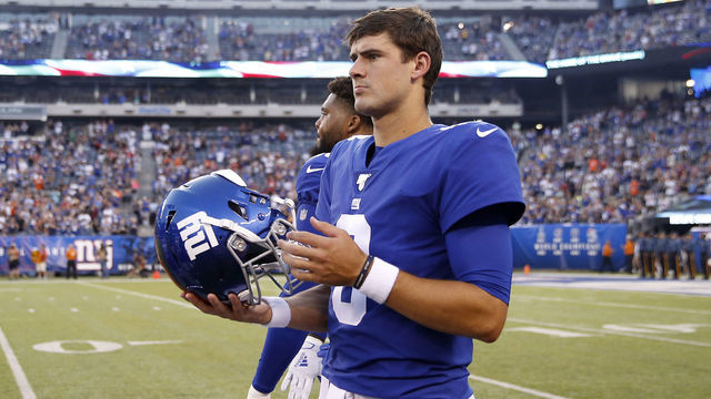 EAST RUTHERFORD, NEW JERSEY - AUGUST 16: Daniel Jones #8 of the New York Giants stands on the sideline before the game against the Chicago Bears during a preseason game at MetLife Stadium on August 16, 2019 in East Rutherford, New Jersey.