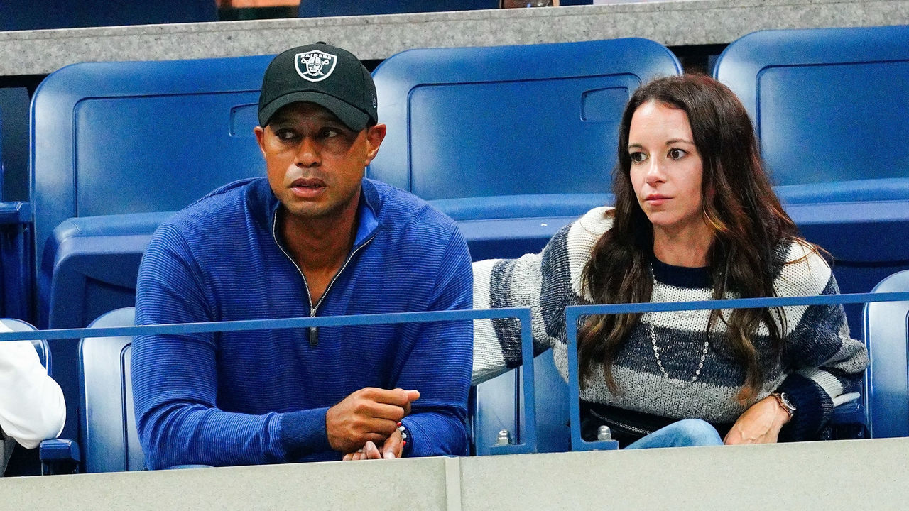 NEW YORK, NY - SEPTEMBER 02: Tiger Woods, son Charlie Axel Woods, and Erica Herman cheer on Rafael Nadal at 2019 US Open in New York City.