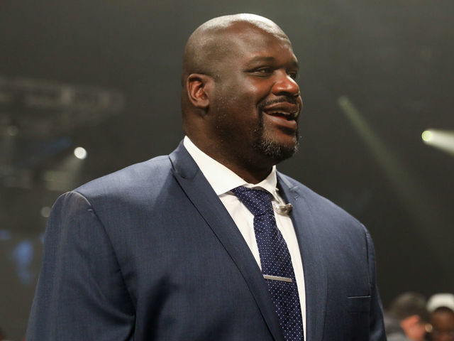 STUDIO CITY, CA - JANUARY 25: Shaquille O'Neal smiling at the Jordan Brand Future of Flight Showcase on January 25, 2018 in Studio City, California.