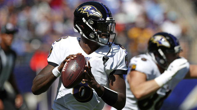 BALTIMORE, MARYLAND - SEPTEMBER 15: quarterback Lamar Jackson #8 of the Baltimore Ravens looks to throw the ball against the Arizona Cardinals during the first half at M&T Bank Stadium on September 15, 2019 in Baltimore, Maryland.