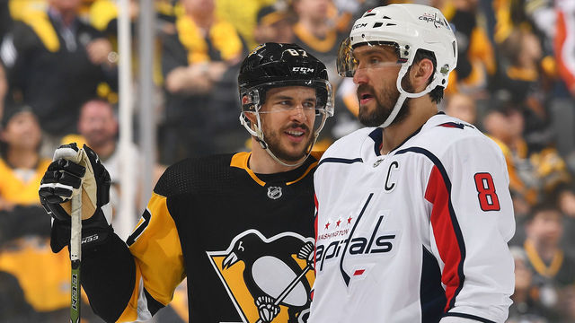 PITTSBURGH, PA - MAY 01: Sidney Crosby #87 of the Pittsburgh Penguins looks on alongside Alex Ovechkin #8 of the Washington Capitals in Game Three of the Eastern Conference Second Round during the 2018 NHL Stanley Cup Playoffs at PPG Paints Arena on May 1, 2018 in Pittsburgh, Pennsylvania. *** Local Caption ***