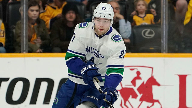 NASHVILLE, TN - APRIL 4: Ben Hutton #27 of the Vancouver Canucks skates against the Nashville Predators at Bridgestone Arena on April 4, 2019 in Nashville, Tennessee.