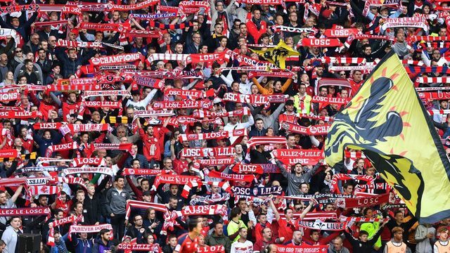 Lille's supporters cheer for their team during the French L1 football match between Lille OSC (LOSC) and Bordeaux at the Pierre-Mauroy Stadium in Villeneuve d'Ascq, near Lille, northern France, on May 12, 2019.
