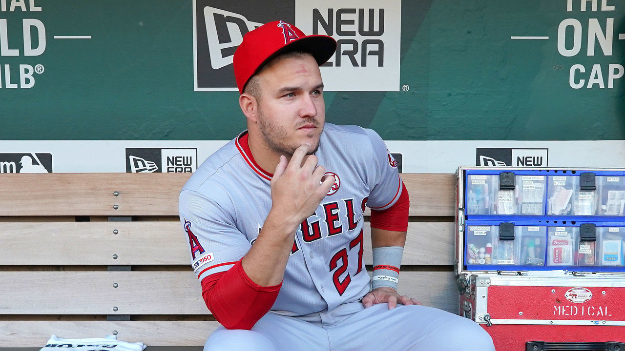 OAKLAND, CALIFORNIA - SEPTEMBER 04: Mike Trout #27 of the Los Angeles Angels of Anaheim sits in the dugout and looks on prior to his game against the Oakland Athletics at Ring Central Coliseum on September 04, 2019 in Oakland, California.